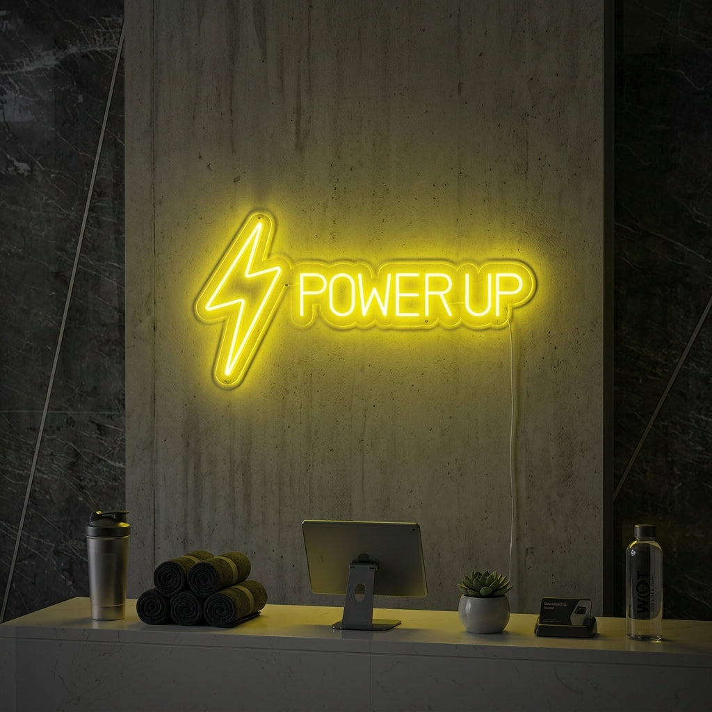 A vibrant 'Power Up' neon sign, perfect for gym decor, showcasing motivational fitness quotes in a modern workout setting.