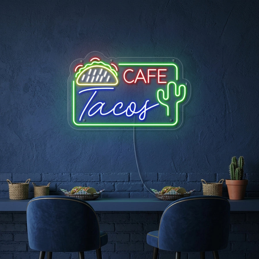 A glowing 'MEXICAN CAFE TACOS' neon sign with blue and yellow tubing illuminating a rustic brick wall, flanked by shelves of tequila bottles and vibrant decorations.