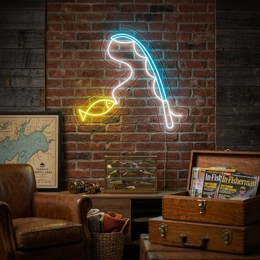 A 'Fishing' neon sign in a blue color on a wooden wall above a cozy fireplace and rustic furniture.