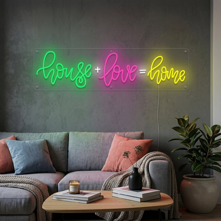 A glowing 'House Love Home' neon wall sign in a modern cozy living room setting.