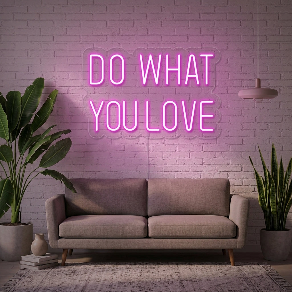 Do What You Love script neon sign glowing in a stylish home office setting.