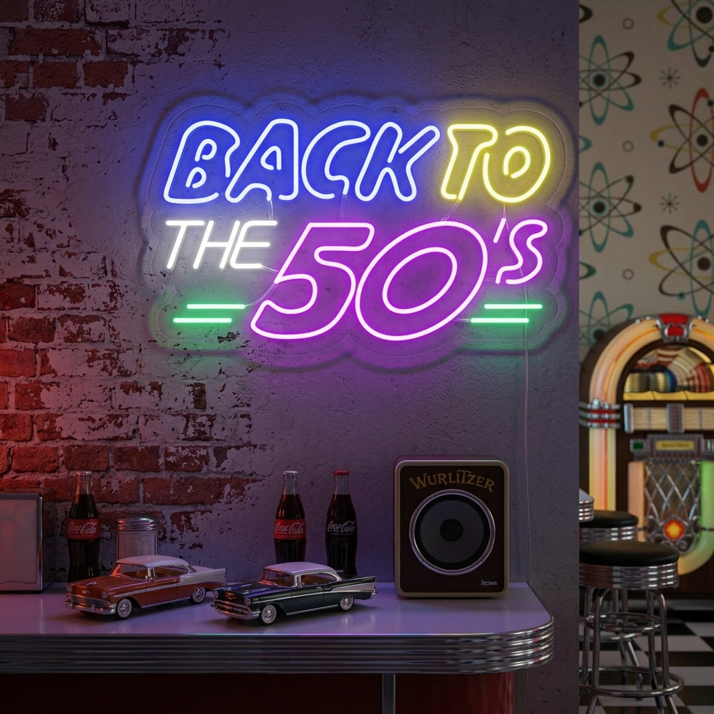 Vibrant pink 'Back To The 50s' retro neon sign glowing above a vintage jukebox, vinyl records, and chequered floor details.