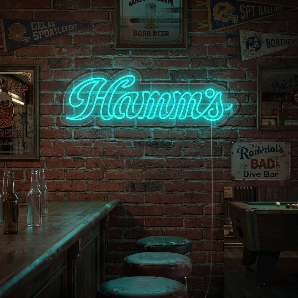 A glowing blue Hamm's Beer Bar neon sign with the classic bear logo, hanging in a dimly lit bar setting.
