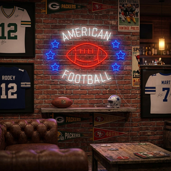 A glowing American Football neon sign mounted on a textured brick wall in a cozy home bar or game room setting.