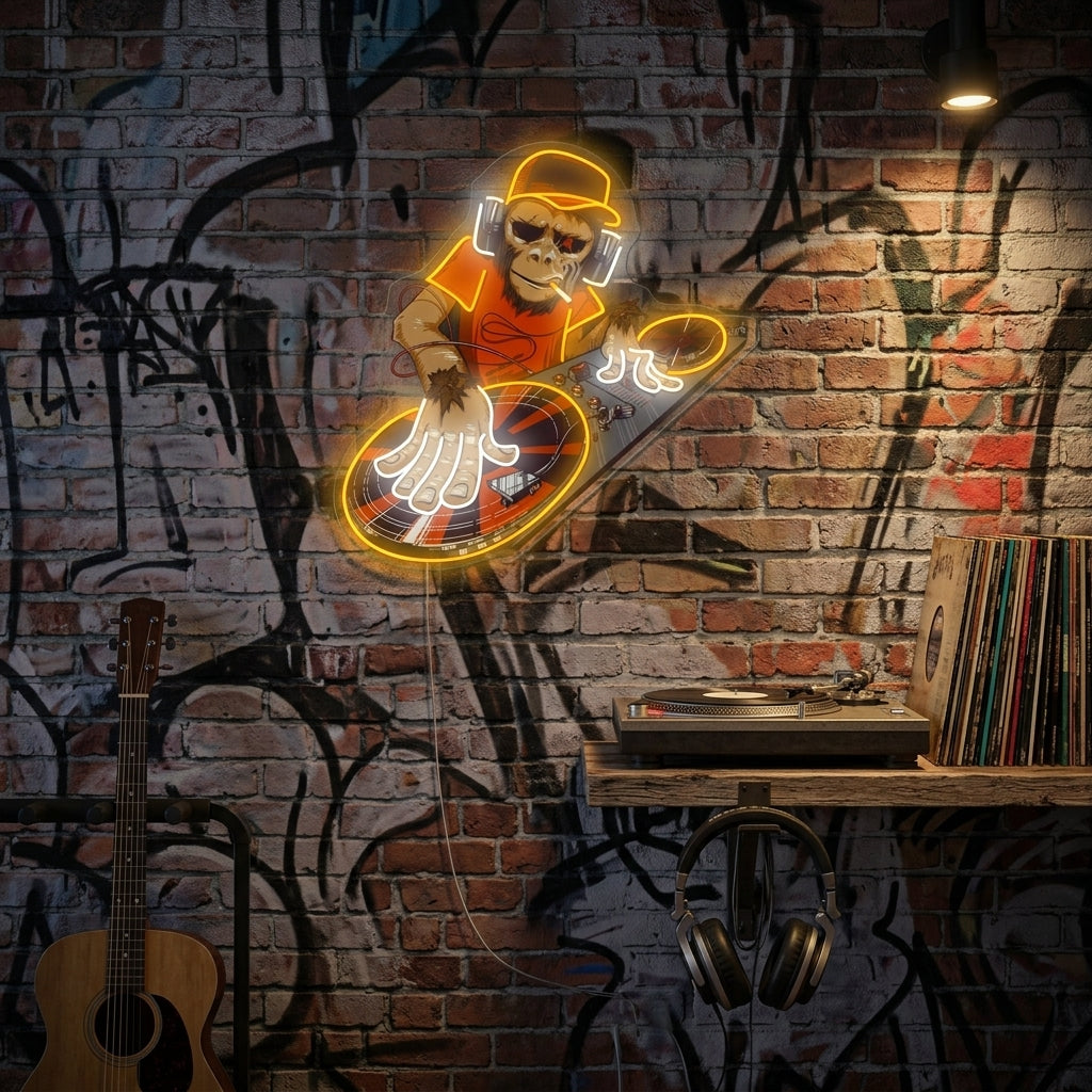 A vibrant 'Monkey DJ' neon sign glowing with colorful lights, featuring a stylized monkey wearing headphones and a cap, actively mixing music on two turntables and a mixer, hanging on a dark brick wall.
