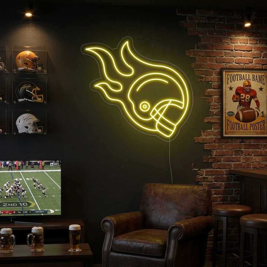 Illuminated rugby players helmet neon sign on a textured dark wall above a black couch, showing the orange and white light effect.