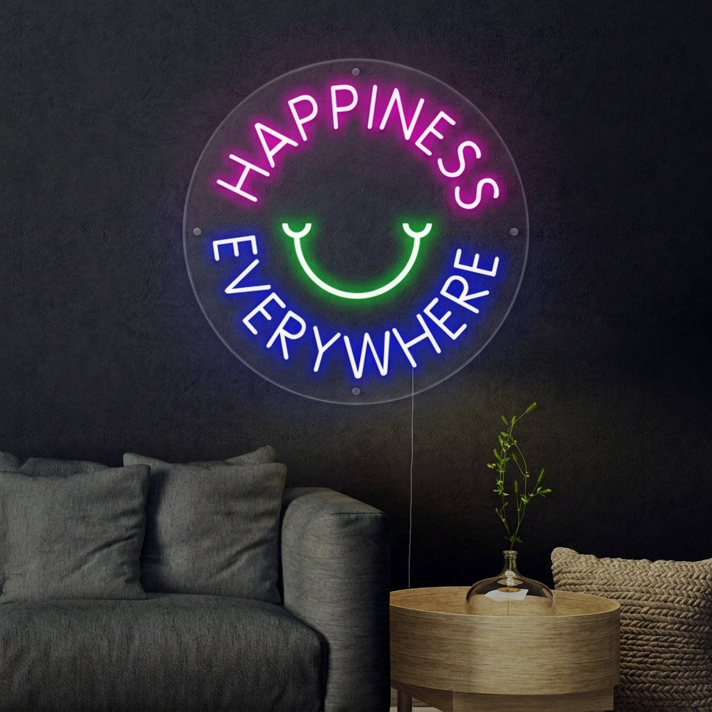 A lifestyle photo of the 'Happyness Everywhere' glowing script neon sign mounted on a brick wall above a cozy armchair.