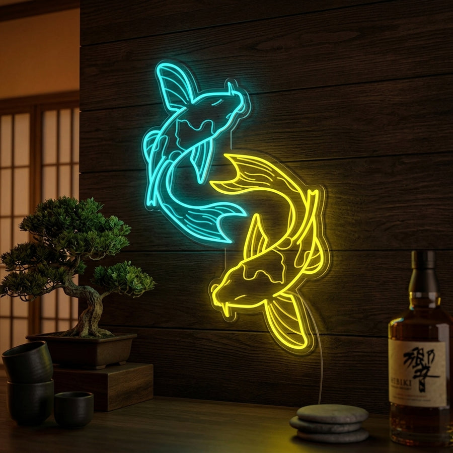 A vibrant orange and blue neon sign depicting a swirling koi fish pair mounted in a stylized, modern room.
