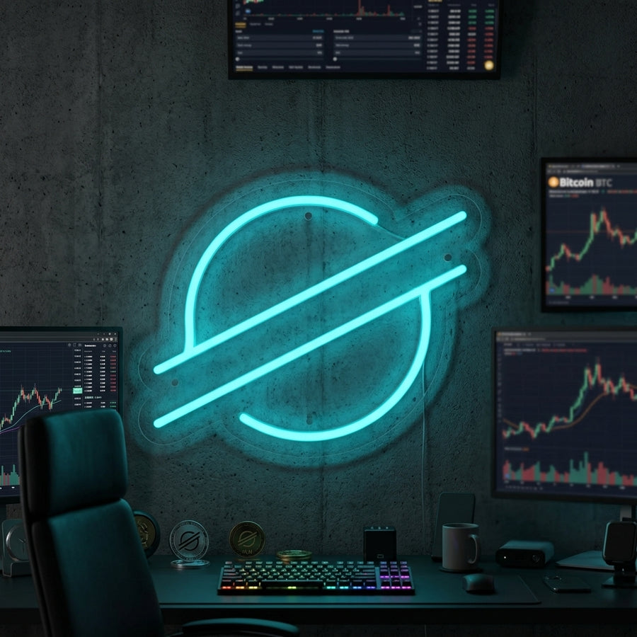 Vibrant blue and white 'Stellar XLM' neon sign glowing brightly on an office wall above a modern desk setup.