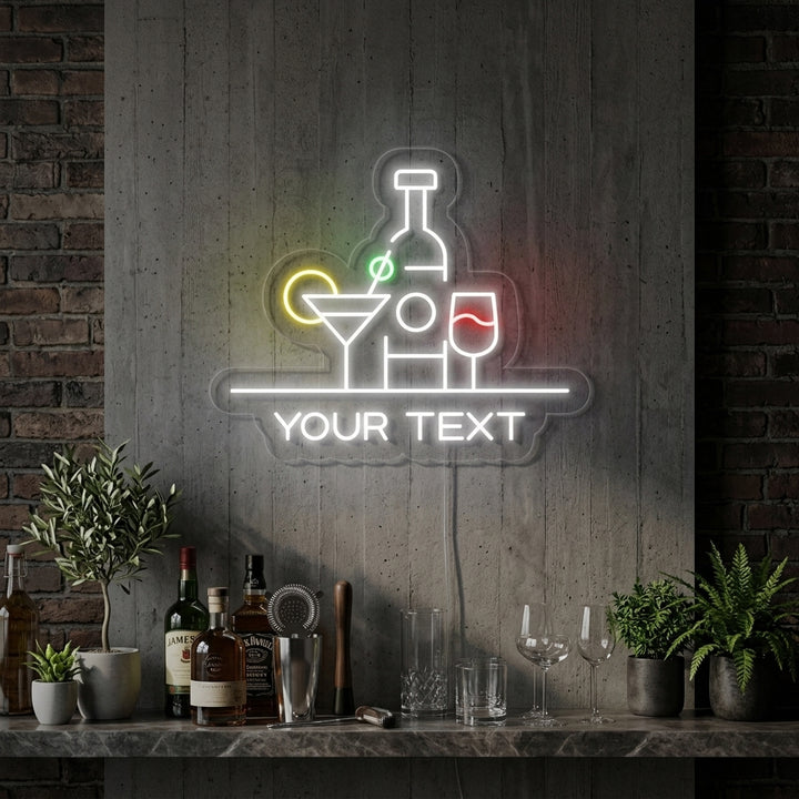 A vibrant 'Custom Cocktails Bar' neon sign illuminated above a modern home bar counter with cocktail ingredients.