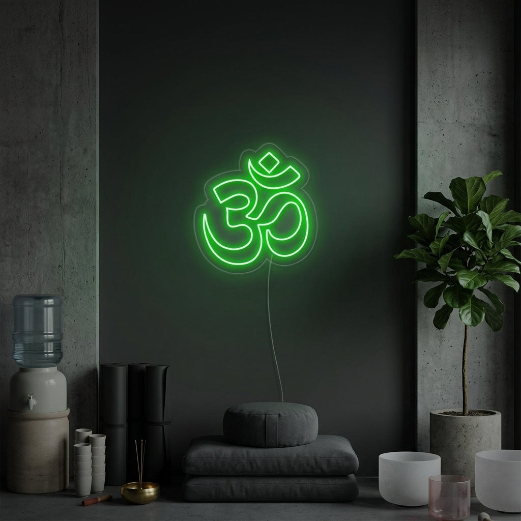 A glowing blue Om symbol neon sign illuminates a serene yoga studio setting with mats, blocks, and plants.