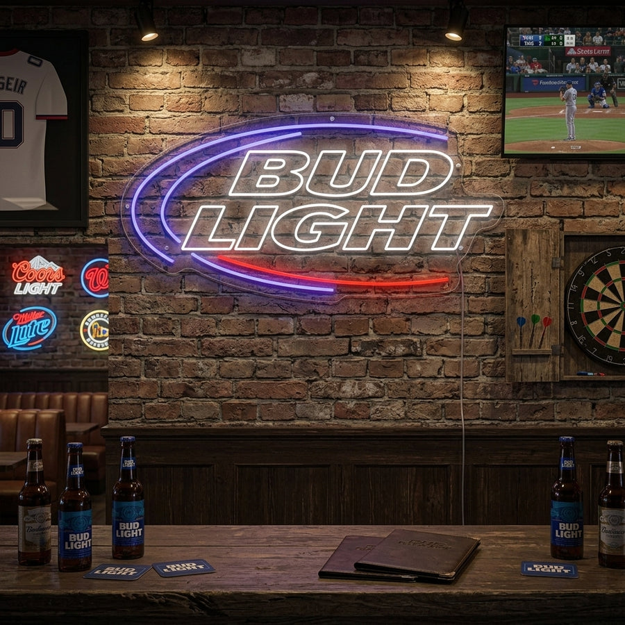 A Bud Light neon bar sign illuminating a styled bar environment, showcasing the blue and white logo on a wall.