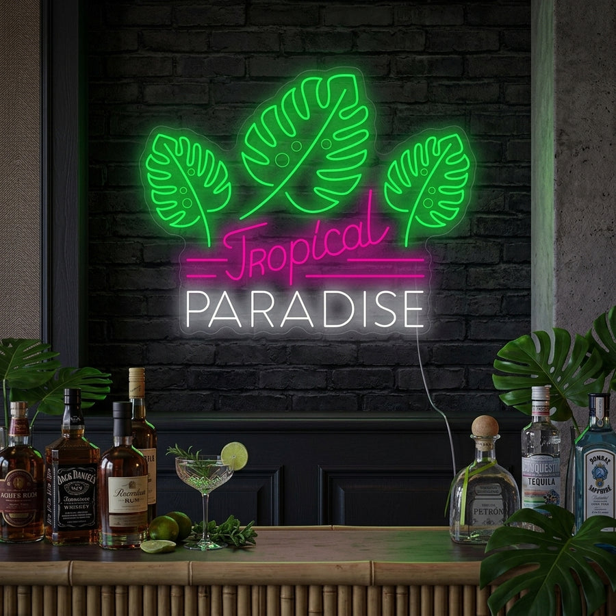 A stunning lifestyle shot showing the vibrant 'Tropical Paradise' neon sign illuminated on a wall in a sophisticated bar, creating a cozy and inviting cocktail atmosphere.