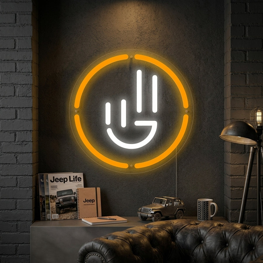A glowing Jeep Wave Customer Care Program neon sign mounted on a brick wall in a garage, featuring blue and white light.