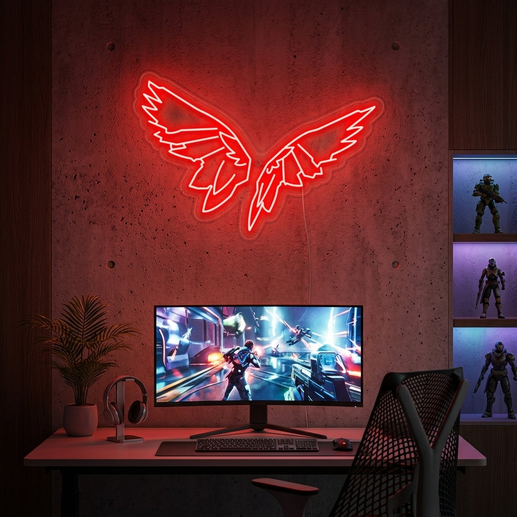 A glowing Fortnite Wings neon sign displaying the iconic battle pass wings symbol on a gamer's room wall, casting a cool blue and purple light on nearby gaming equipment.