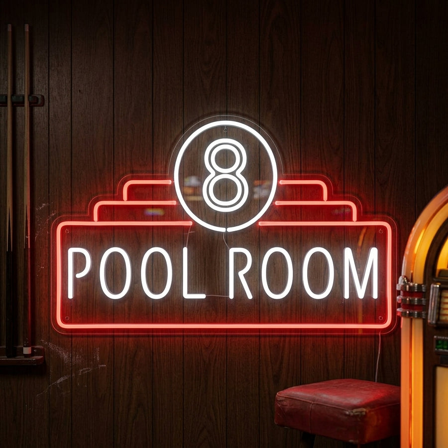 A glowing '8 Pool Room' neon sign with an 8-ball graphic mounted above a pool table in a dimly lit, cozy game room setting.