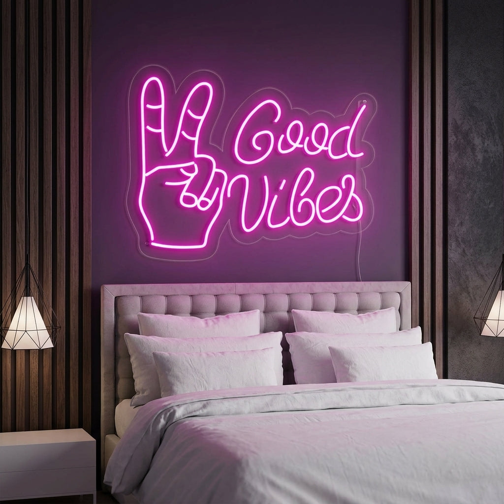 A "Good Vibes With Yes" neon sign mounted on a white painted brick wall in a modern living room setting.
