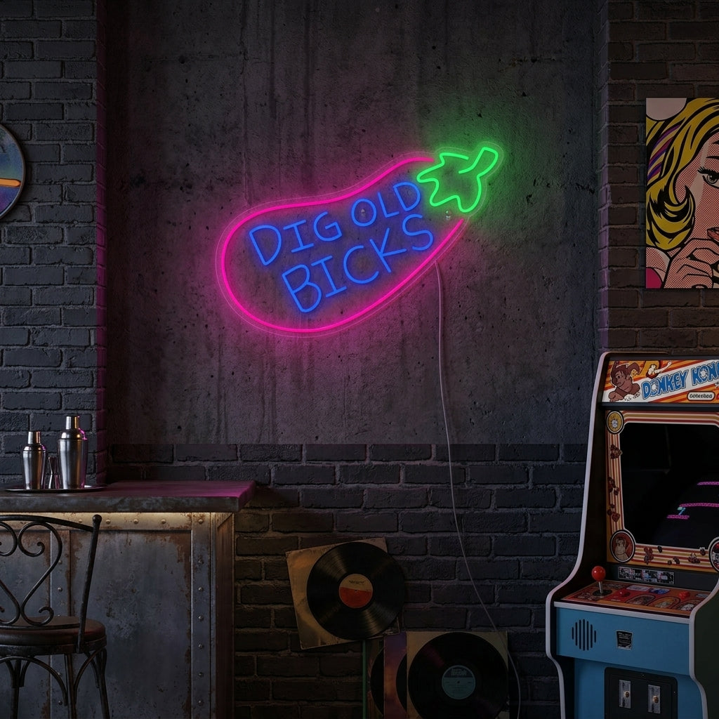 A lifestyle photograph showing the glowing 'Big Old Bicks Eggplant' neon sign displayed on a brick wall in a modern living room setting.