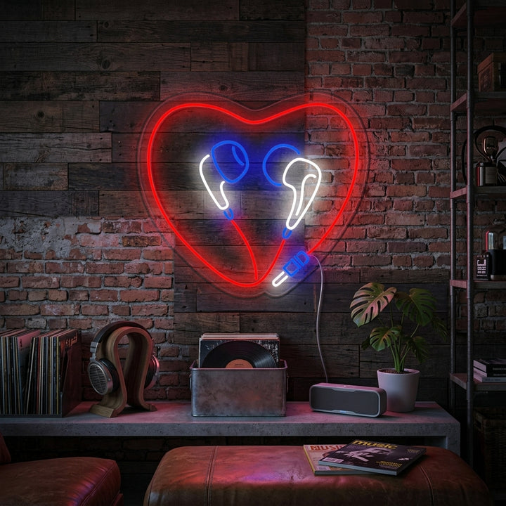 "Heart Earphones" neon sign glowing in a modern living room setting