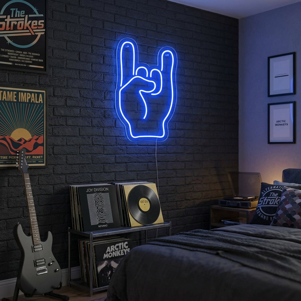 A hand forming the rock on sign illuminated in vibrant neon, glowing brightly on a brick wall in a lifestyle setting.