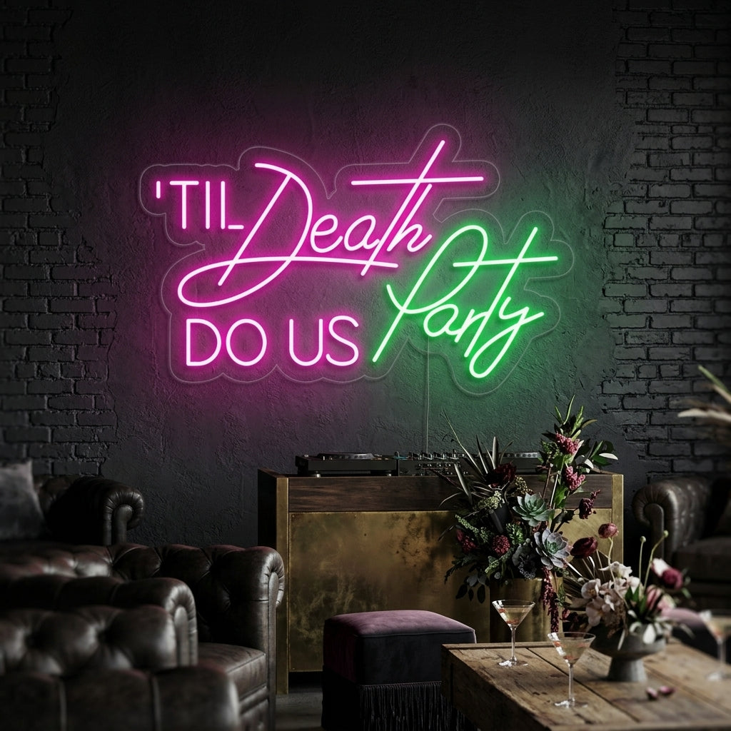 White glowing Till Death Do Us Party script neon sign mounted on a rustic wooden wall above a cozy floral display.
