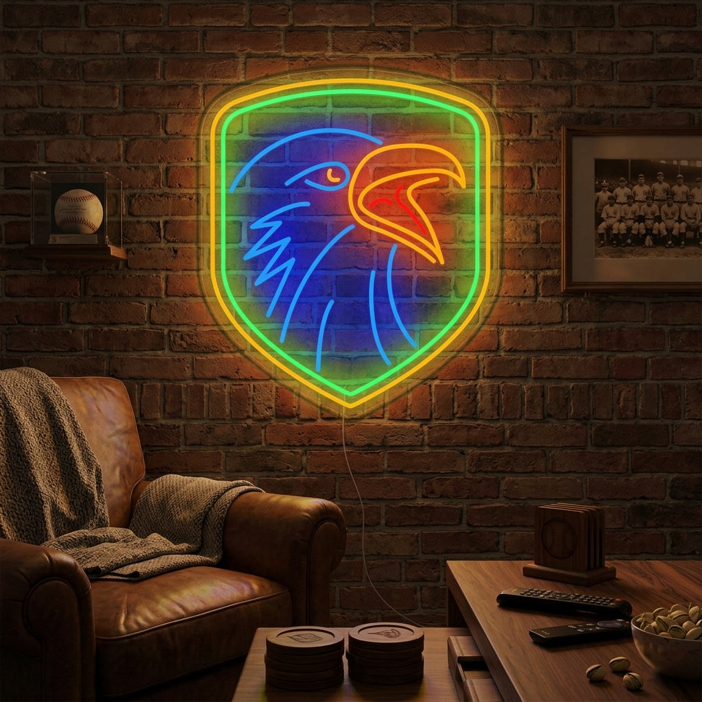 A glowing blue and yellow neon sign depicting an eagle with a shield on a brick wall in a rustic room.