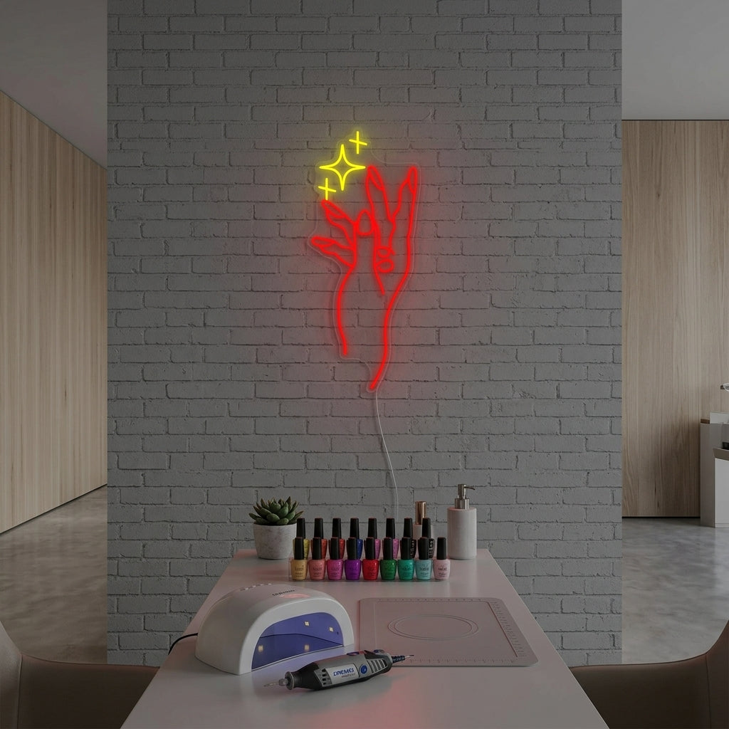 A glowing neon sign featuring a hand with long, painted red nails and white geometric outlines is mounted on a textured grey wall in a brightly lit nail salon setting.