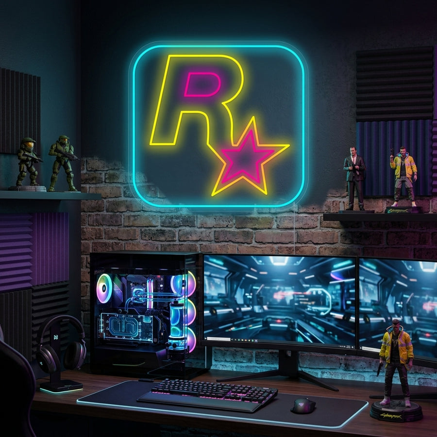 A glowing yellow Rockstar Games R* logo neon sign mounted on a textured brick wall in a rustic game room setting.
