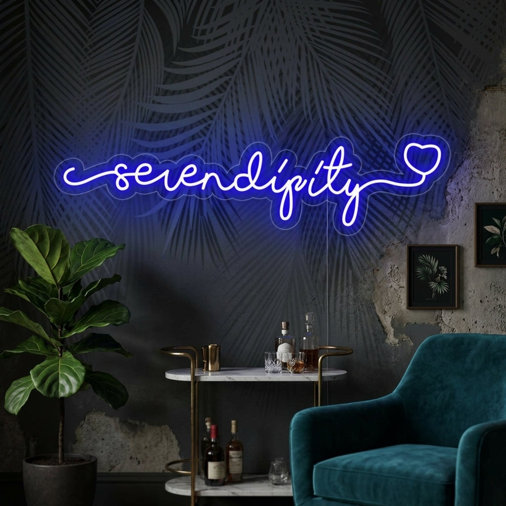 Handcrafted "Serendipity" neon sign displayed on a white wall in a modern bedroom setting with a natural wood shelf and green plants.