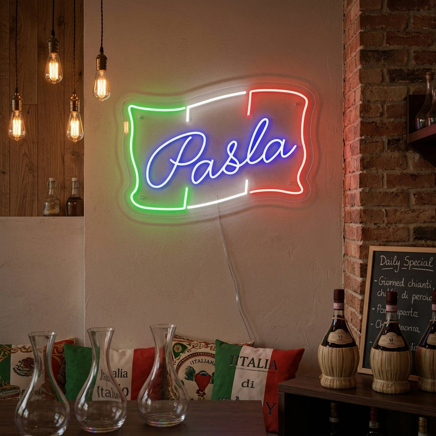 Vibrant 'PASTA' neon wall decor sign illuminating a modern kitchen space.