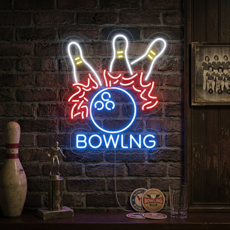 Vibrant Bowling Ball neon sign in a decorated garage, casting light next to tools and retro gear.