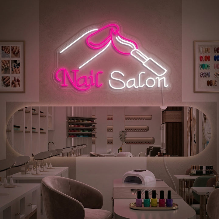 A glowing 'Nails' neon sign mounted on a stylish nail salon wall, enhancing the decor and atmosphere.