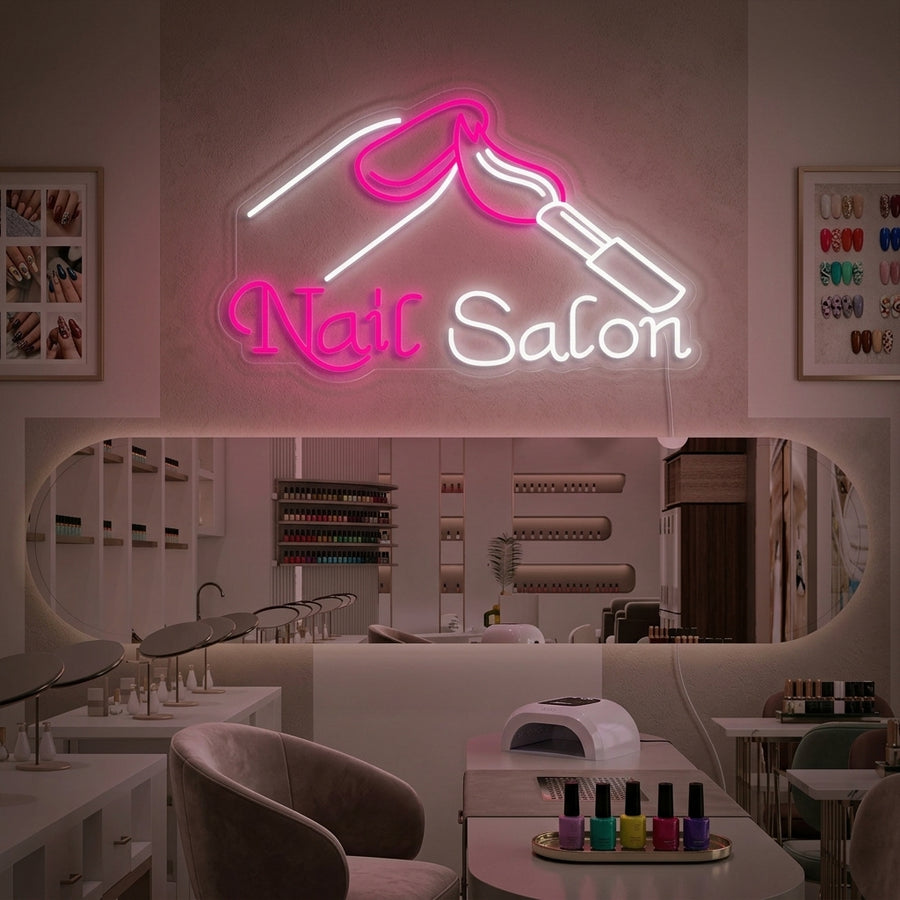 A glowing 'Nails' neon sign mounted on a stylish nail salon wall, enhancing the decor and atmosphere.