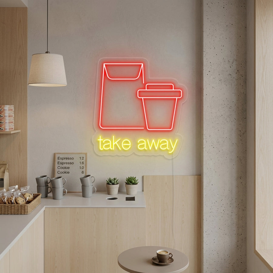A glowing 'Take Away' neon sign mounted on a textured brick wall, illuminating a cozy kitchen counter area with a welcoming ambiance.