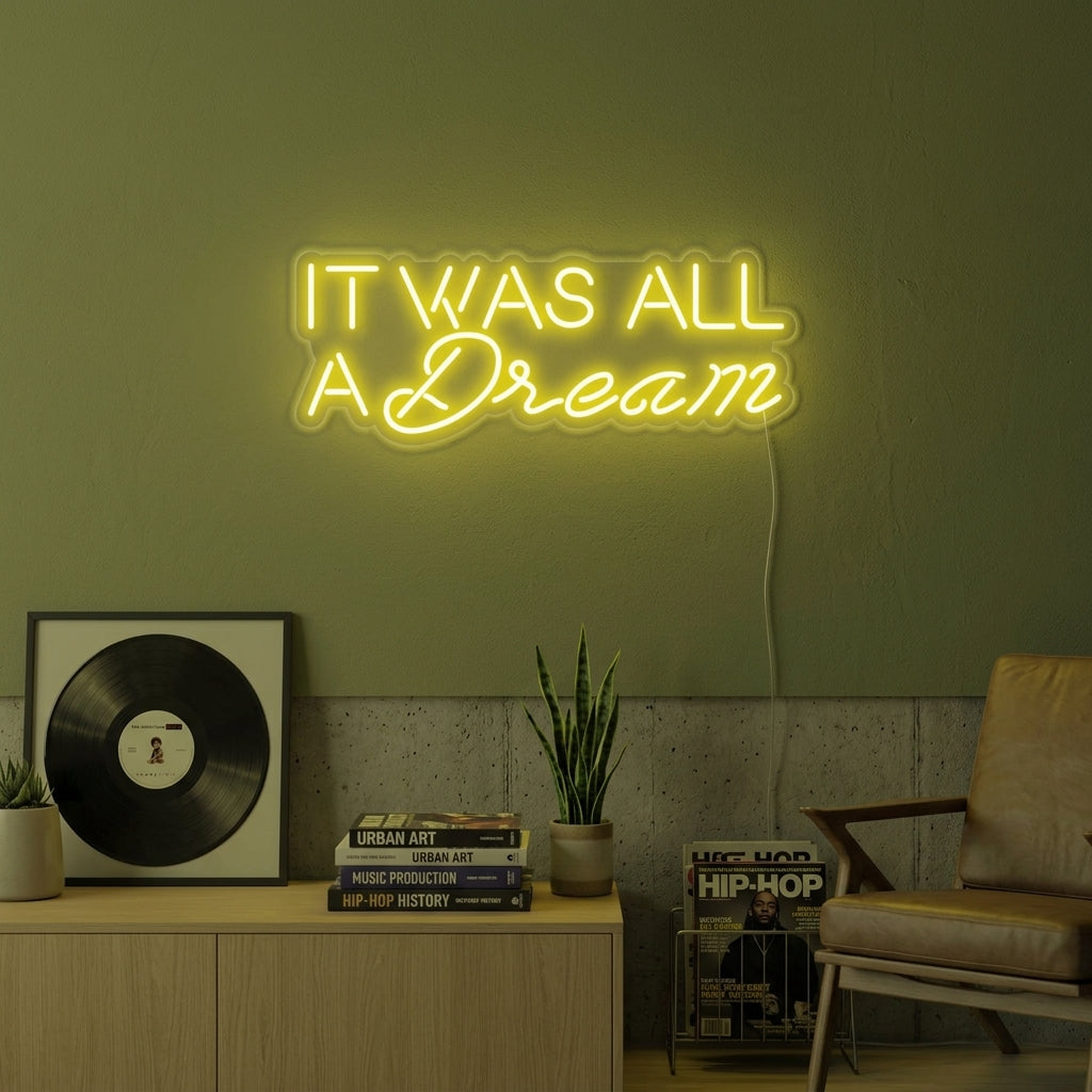 A cozy bedroom setting featuring the 'It Was All A Dream' neon sign glowing softly above a bed, creating an inspiring aesthetic mood.