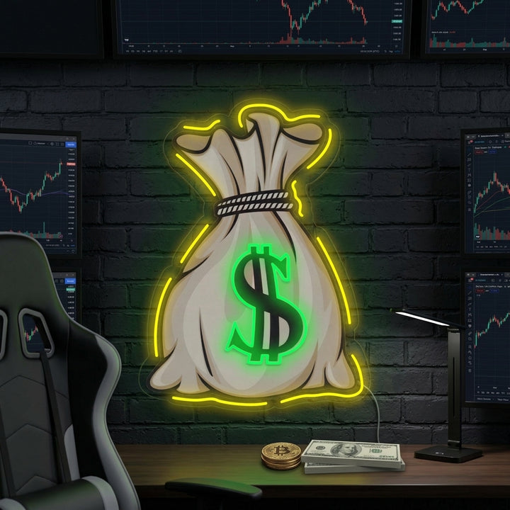 Money Bag UV Print neon sign glowing with dollar sign graphic and orange/green tubing on a wall.