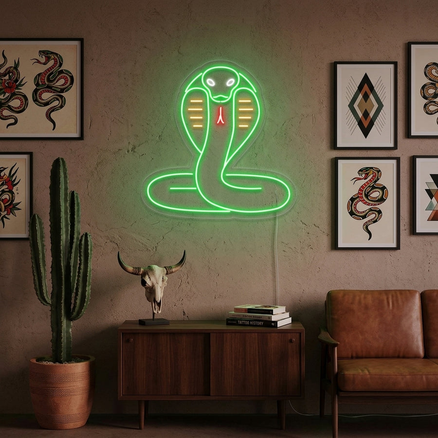 A close-up photograph showing the intense glow of the Cobra Snake neon sign mounted on a textured brick wall in a dimly lit bar.