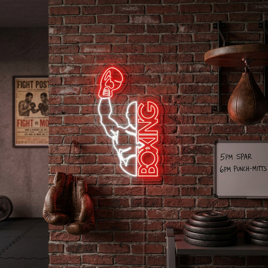 A wall-mounted neon sign depicting a boxer in a fighting stance, brightly glowing on a textured brick background.