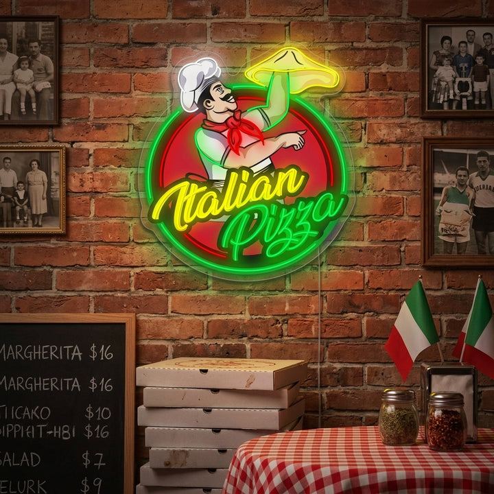 Italian Pizza neon sign glowing red, white, and yellow against a rustic brick wall above a cozy pizzeria booth and fresh pizza.