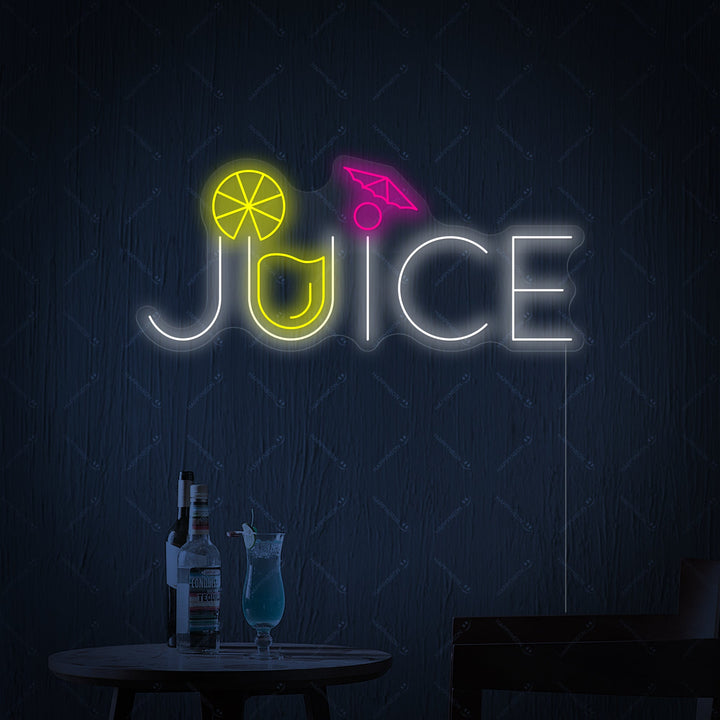 The 'Juice' neon sign glowing orange, clearly showing its clear acrylic backboard and electrical cord against a clean white wall.