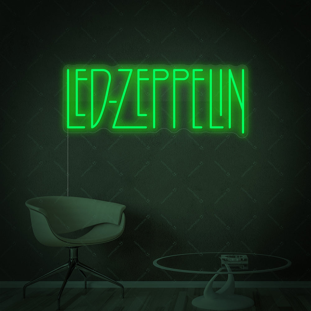 'LED Zeppelin' neon sign design with a clear acrylic backer providing a soft glow on a light blue wall.