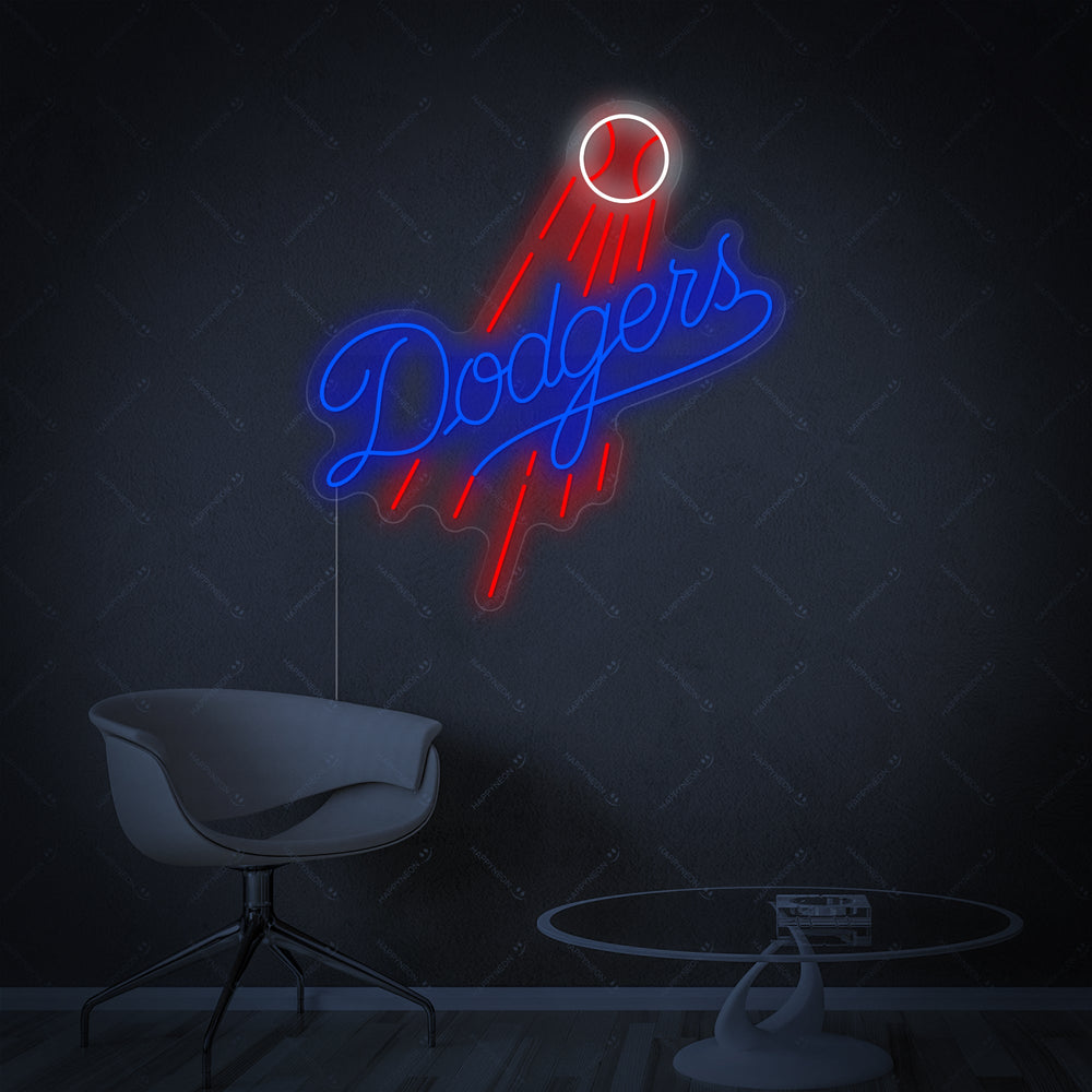Close-up of the iconic 'Los Angeles Dodgers' script logo on a custom neon sign glowing blue against a dark wall.