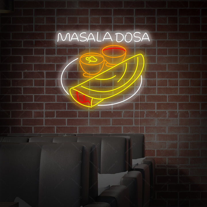 A close-up view of the 'Masala Dosa' neon sign, showing the detail of the tubing, the mounting hardware, and the clear acrylic backboard.
