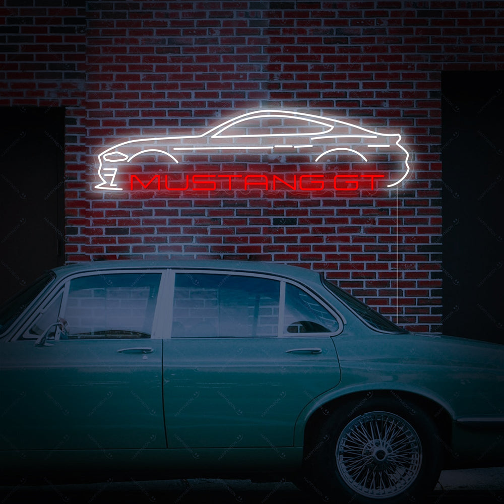Close up view of the blue Mustang GT neon sign graphic on a rustic background