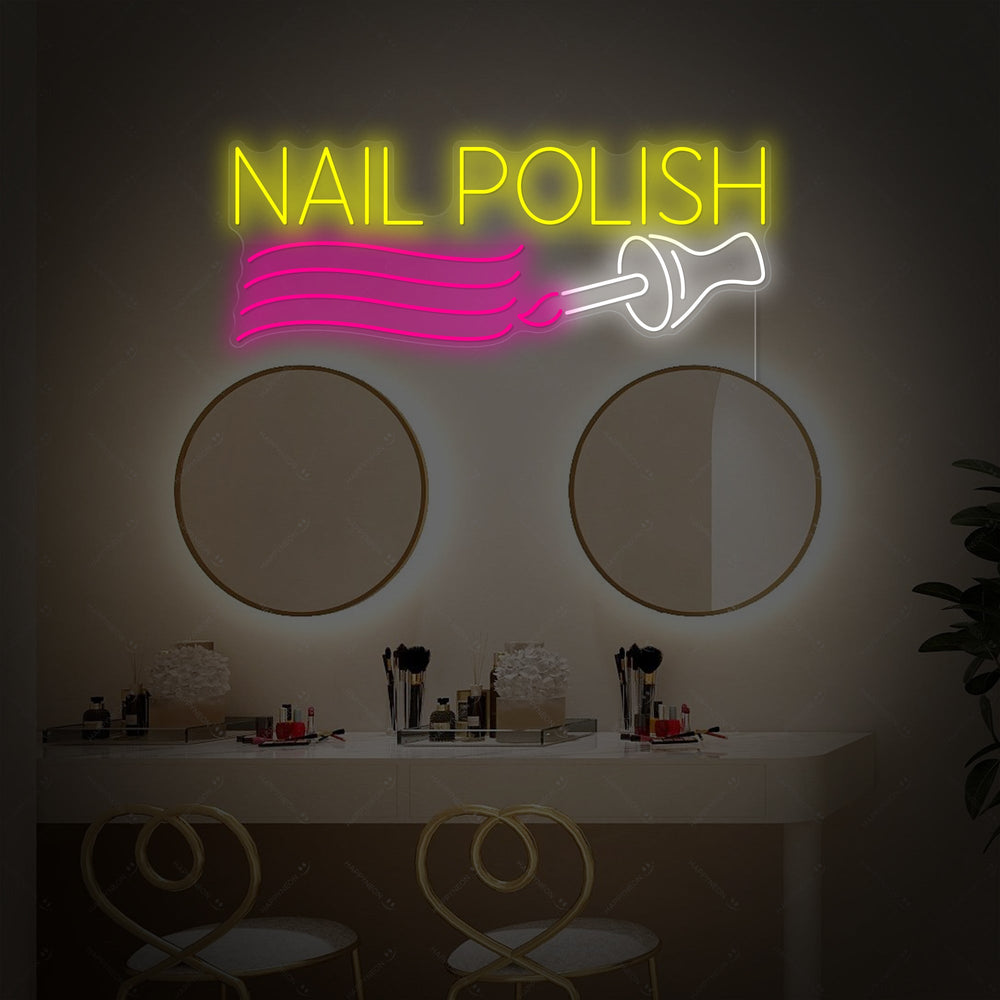 A glowing 'Nail Polish' neon sign with a decorative polish bottle icon mounted on the wall above a wooden salon desk with manicuring tools and bottles.