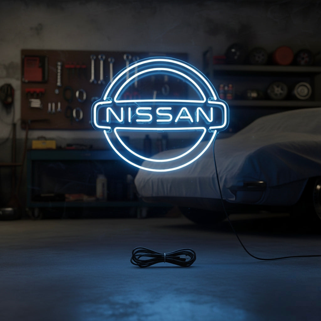 A bright blue and white neon sign displaying the classic circular Nissan logo mounted on a wooden wall in a clean garage environment.