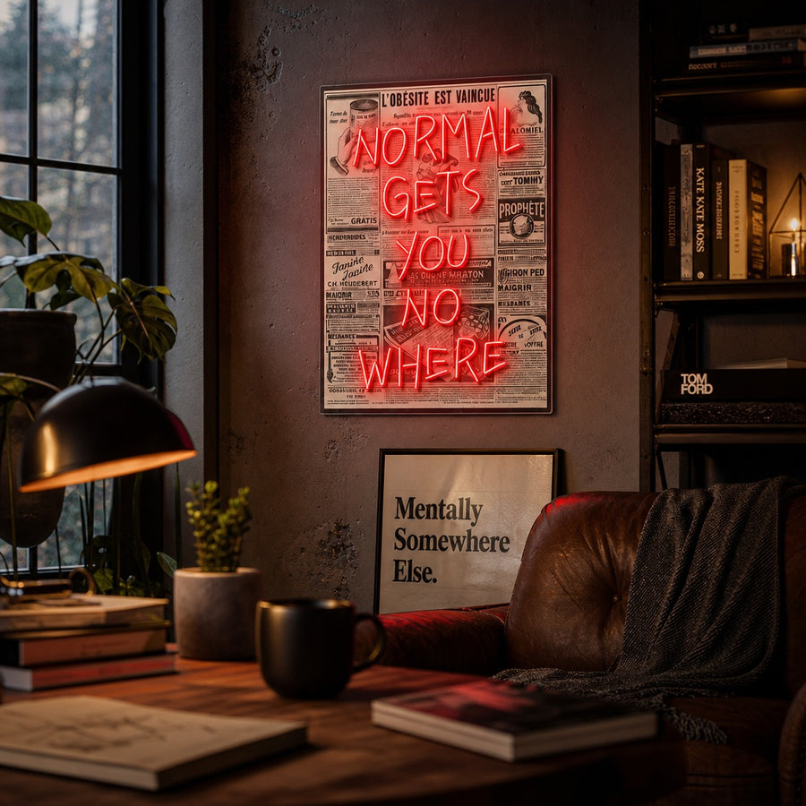 A glowing 'Normal Gets You Nowhere' neon sign displayed as motivational wall decor in a modern loft apartment living room, casting a vibrant blue hue.