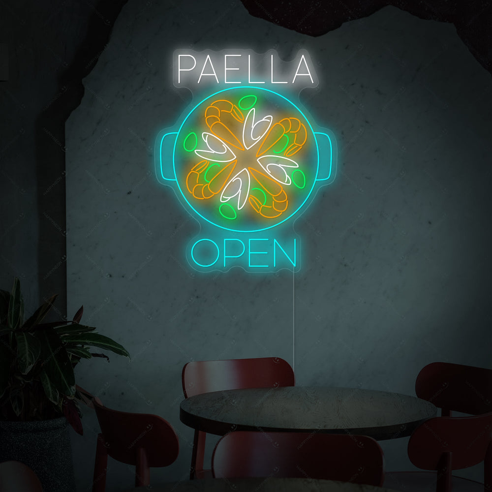 A colorful 'Paella Open' neon sign against a contrasting background, highlighting the glowing letters.