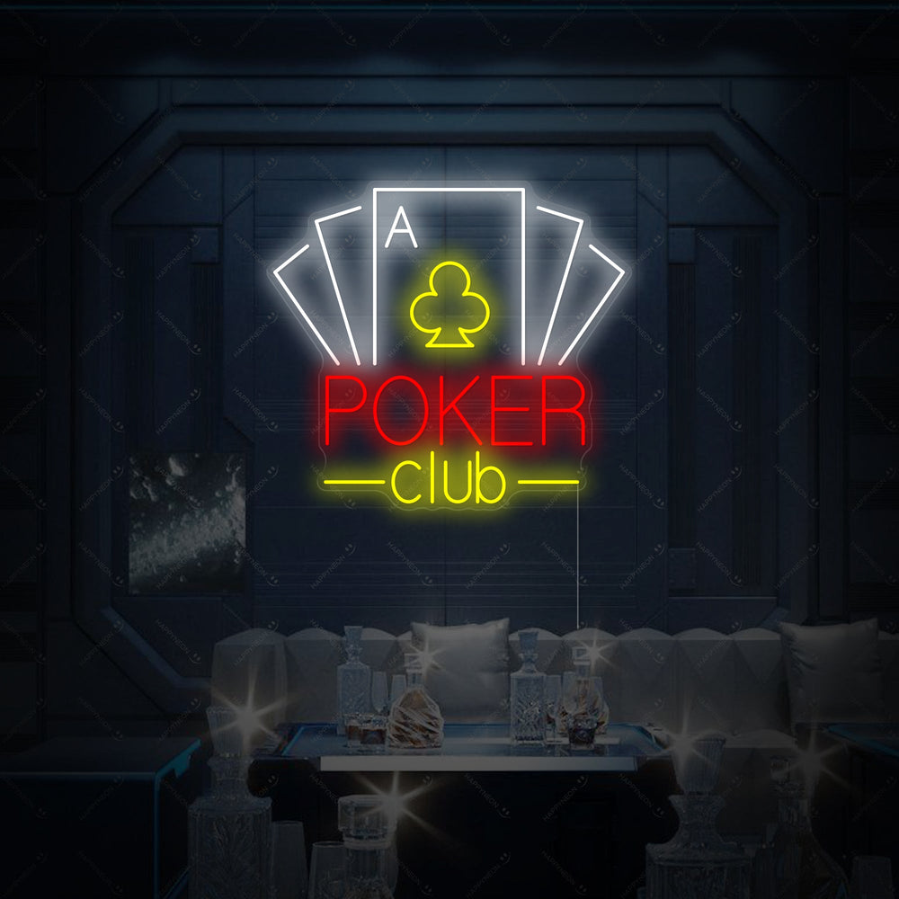 Close-up of the 'Poker Club' neon sign with text and card suits, displayed on a clean wooden background.