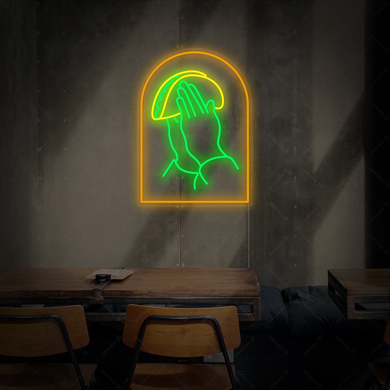 A product shot of the 'Praying Hands With Tacos' neon sign, clearly showing the colorful glowing design against a simple background.